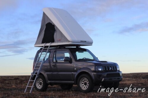 Suzuki Jimny with rooftop tent and ladder